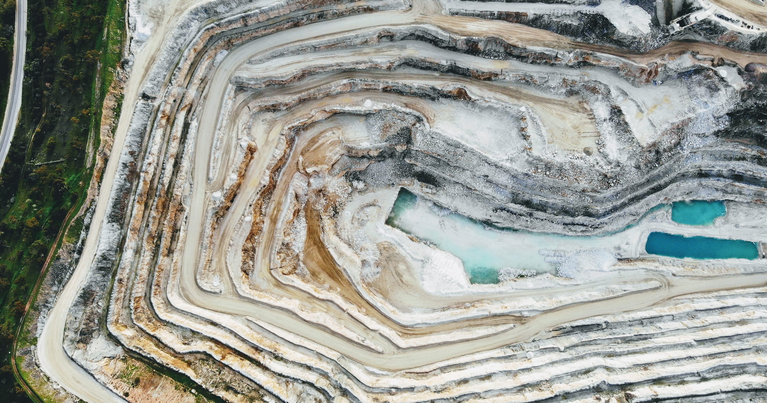 Earth Observations for Multi-Scale Monitoring of Mining Impacts